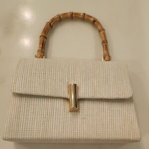 Elegant Cream Handbag with Bamboo Handle
